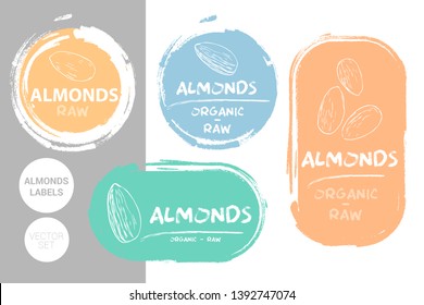 Almonds colorful label set. Raw organic almond nuts Badge shapes. Creative Nut tags. Raw food stickers ready for web and print. Painting brush style labels. Brush stroke badges in pastel colors.