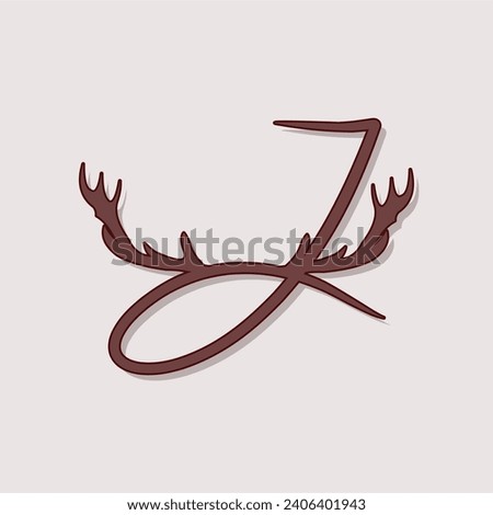 Alphabet with antlers. Series of letters A-Z. Minimalism. Beautiful letters. The initial design of the J logo is combined with deer antlers. ABC. Foto stock © 