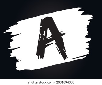 A - Alphabet with brush effect and black background.