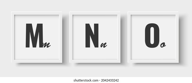 Alphabet concept placed in a photo frame against a wall background. Suitable for children's room interiors.