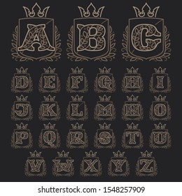 Alphabet consisting of floral pattern letters in a heraldic shield with crown. Can be used for security, hotel, resort, restaurant, boutique, jewelry, interior and fashion industry.