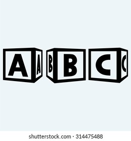 Alphabet cubes with A,B,C letters. Isolated on blue background