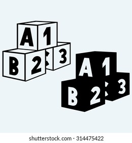 Alphabet cubes with A,B,C letters and numerals. Isolated on blue background
