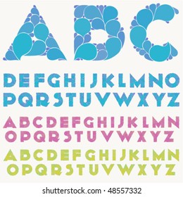 Alphabet of drops in three different colors