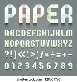 Alphabet folded of toilet green paper. Roman alphabet & Arabic blue numerals (A, B, C, D, E, F, G, H, I, J, K, L, M, N, O, P, Q, R, S, T, U, V, W, X, Y, Z, 0, 1, 2, 3, 4, 5, 6, 7, 8, 9).