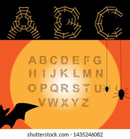 Alphabet in the form of a web on an orange background.