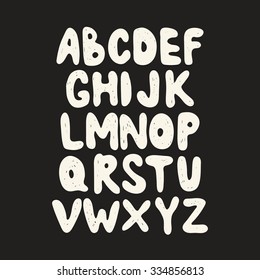 Alphabet. Hand drawn letters isolated on dark background. Vector illustration. Design elements for scrapbooking.