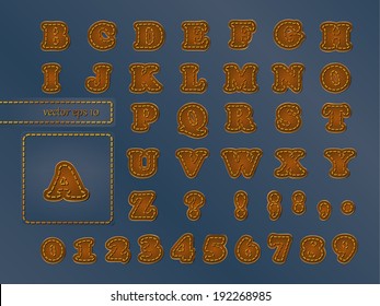 Alphabet imitating leather patches on denim fabric