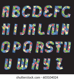 Alphabet letters of different colors pastel Alphabet letters of different colors paste with shadow on black background