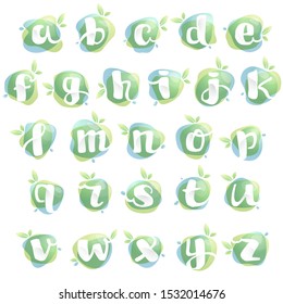 Alphabet letters with negative space at green watercolor splash background. Vector elements for organic food labels, ecology presentation, card etc.
