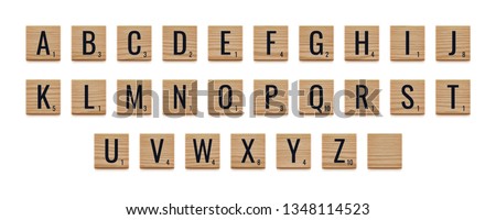 Alphabet letters on wooden pieces. Realistic vector illustration. Classic board game.