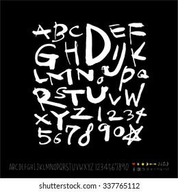 alfabeto y números - dibujado a mano en vector / manuscrito