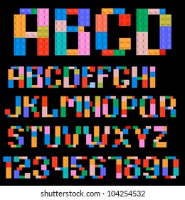 Alphabet and numbers made of plastic building blocks