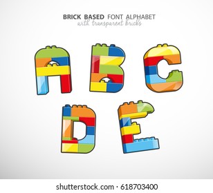 Alphabet set created from playing bricks with some transparent elements.