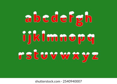 Alphabet with snow capped effect with red on green background. Christmas and New Year celebrations concept.