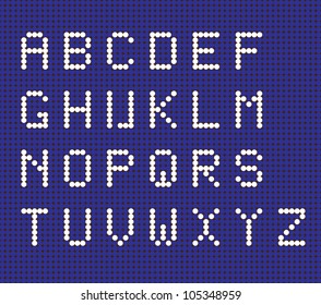 Alphabet of white dots on a blue background. Vector / Alphabet of the points