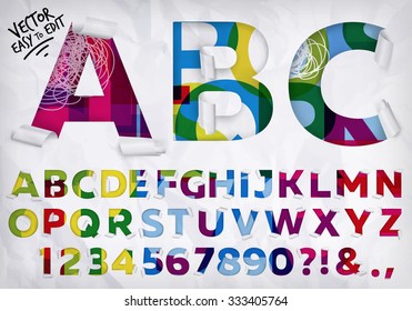 Alphabet wrapped edge of the letters cut out from crumpled paper on vivid background