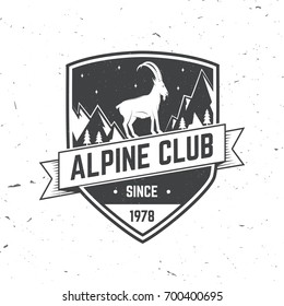 Alpine club badge. Vector illustration. Concept for shirt or logo, print, stamp or tee. Vintage typography design with rock climbing Goat and mountain silhouette. Outdoors adventure emblem.