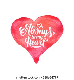 Always in my Heart hand lettering on watercolor Heart background illustration. Handmade vector calligraphy for print, card, invitation