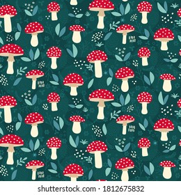 Amanita mushroom seamless pattern design - cute red mushrooms with white dots on green background
