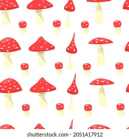 Patrón de hongos de Amanita sin fisuras.Patrón vectorial de las agrias de moscas de diferentes tamaños.