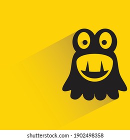 amazed monster with shadow on yellow background