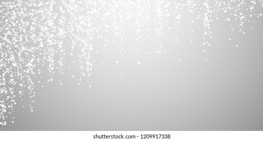Amazing falling snow Christmas background. Subtle flying snow flakes and stars on light grey background. Admirable winter silver snowflake overlay template. Dazzling vector illustration.