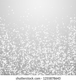 Amazing falling snow Christmas background. Subtle flying snow flakes and stars on light grey background. Admirable winter silver snowflake overlay template. Tempting vector illustration.