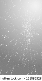 Amazing falling stars Christmas background. Subtle flying snow flakes and stars on grey background. Adorable winter silver snowflake overlay template. Mesmeric vertical illustration.