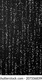Amazing falling stars Christmas background. Subtle flying snow flakes and stars on black background. Alive winter silver snowflake overlay template. Appealing vertical illustration.