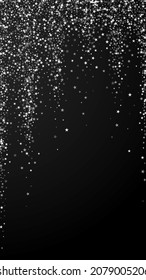 Amazing falling stars Christmas background. Subtle flying snow flakes and stars on black background. Alive winter silver snowflake overlay template. Trending vertical illustration.