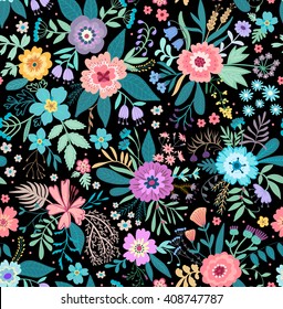 Amazing floral pattern with bright colorful flowers, plants, branches and berries on a black background. The elegant the template for fashion prints.