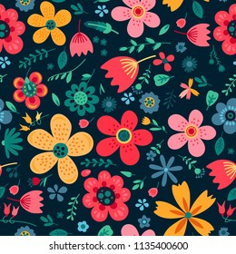 Amazing floral vector seamless pattern of bright colorful flowers in cute vintage style.Beautiful colorful flowers background. Spring primitive texture. Design folk style concept for fashion print.