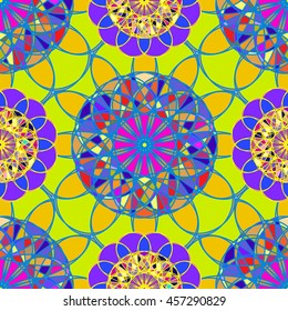 Amazing multicolor kaleidoscope diamond on a background of leaves seamless pattern for new design.