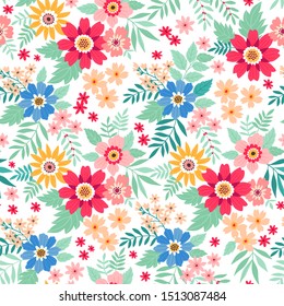 Amazing seamless floral pattern with bright colorful flowers and leaves on a white background. The elegant the template for fashion prints. Modern floral background. Folk style.