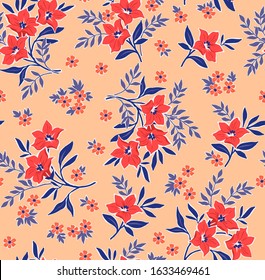 Amazing seamless floral pattern with bright red flowers and leaves on a coral background. The elegant the template for fashion prints. Modern floral background.