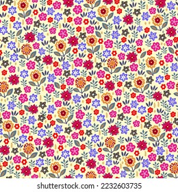 Amazing seamless floral pattern with bright multicolored flowers and leaves on a light yellow background. An elegant template for fashionable prints. Modern floral background. Folk style.