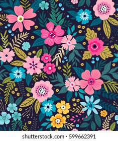 Padrão floral sem costura incrível com flores coloridas brilhantes e folhas em um fundo azul. O elegante modelo para estampas de moda. Fundo floral moderno. Estilo popular.