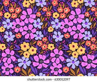Amazing seamless floral pattern with bright colorful flowers and leaves on a dark blue background. The elegant the template for fashion prints. Modern floral background. Folk style.