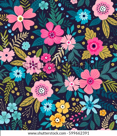 Amazing seamless floral pattern with bright colorful flowers  and leaves on a blue background. The elegant the template for fashion prints. Modern floral background. Folk style.