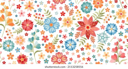 Amazing seamless natural pattern with embroidered flowers, leaves and berries isolated on a white background. Floral print for romantic fabric. Vector illustration.