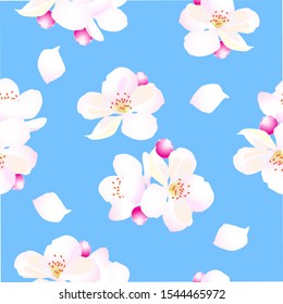 Amazing seamless pattern of apple flowers on a blue background. Can be used for fabrics.
