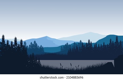 Amazing view of the mountain shrouded in lush trees and wide river in the morning