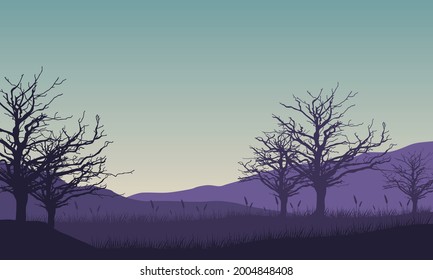 Amazing view of the mountains in the countryside at sunrise with the silhouettes of dry trees around it. Vector illustration of a city
