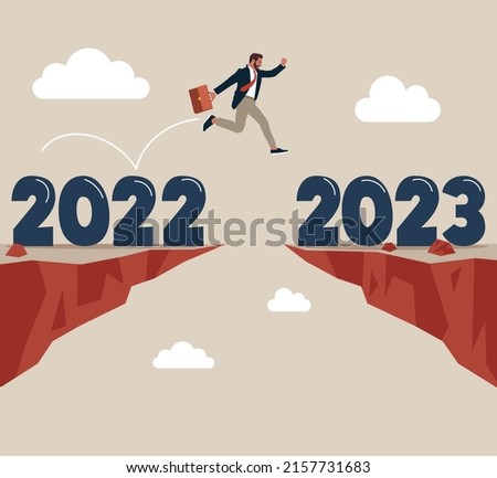 Ambitious businessman jump over year gap from 2022 to 2023. Year 2023 hope, new year resolution or success opportunity, change to new business bright future, overcome business difficulty concept.