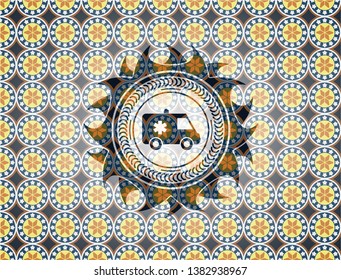 ambulance icon inside arabesque style badge. arabic decoration.