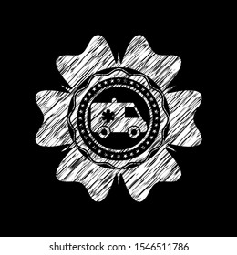 ambulance icon inside chalkboard emblem on black board