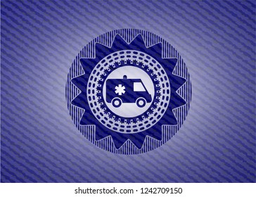 ambulance icon inside emblem with jean background