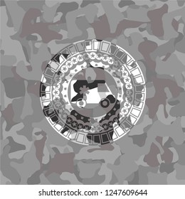 ambulance icon inside grey camo emblem