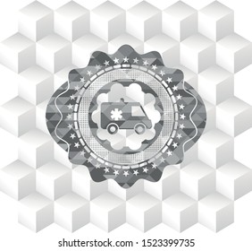 ambulance icon inside grey emblem with cube white background